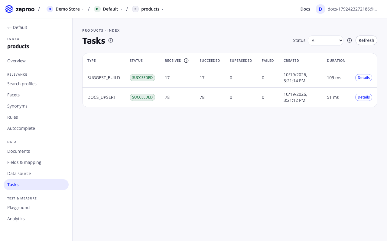 The Tasks page listing a suggestion build and three document upserts, all SUCCEEDED, with received, succeeded, superseded and failed counts and durations